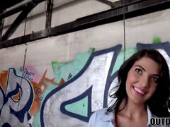 enthralling black-haired Bessi deep throats a strangers dick outdoor