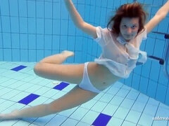Zuzanna's sexy body fully immersed in water