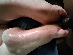 Slippery sole BBW Milf gives BBC first time footjob