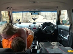 Busty Satine Spark gets naughty during her car driving lesson.