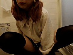 Japanese shemale having anal sex with a dildo in the bathroom at home
