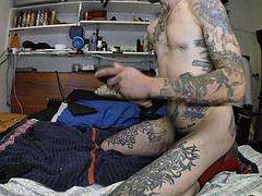 Sexy stud in hot jockstrap rides multiple dildos in bed nice and deep with big cock hanging out